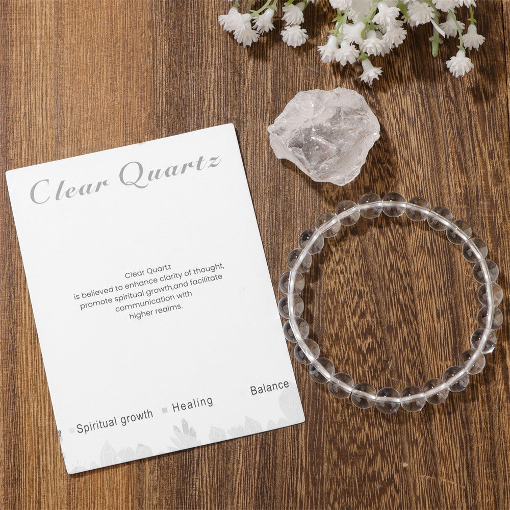 Plan view of a 8mm crystal bead bracelet with natural clear quartz texture.