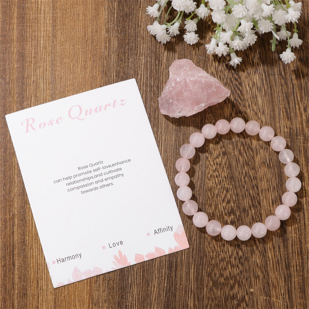Plan view of a 8mm crystal bead bracelet with natural clear quartz texture.
